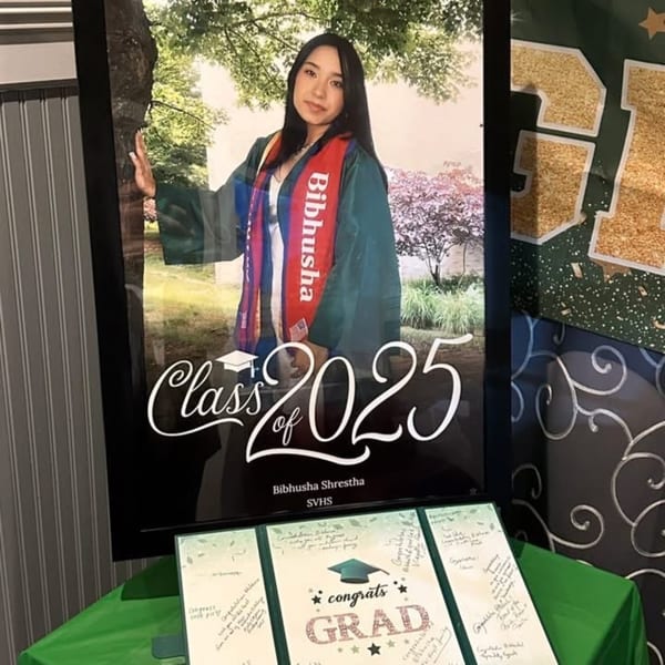 A framed graduation portrait of Bibhusha Shrestha, Class of 2025, with a guest book below.